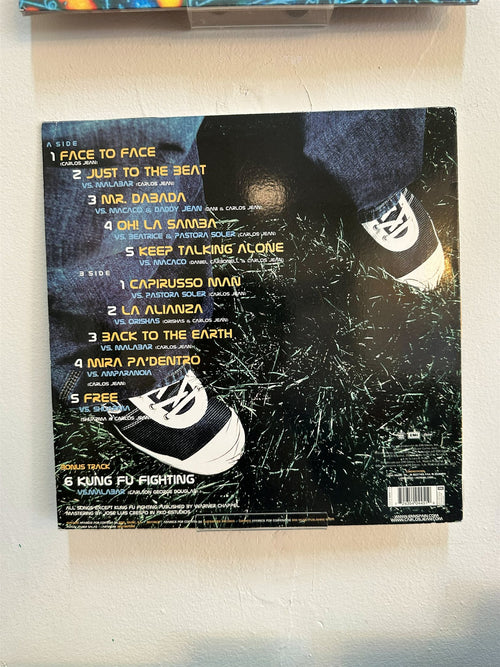 Carlos Jean – Back To The Earth (ESP 2002) — Contraportada